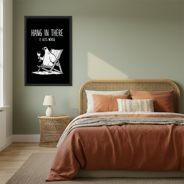 Funny polar bear canvas wall art in a black frame above a cream sofa with a wooden coffee table.