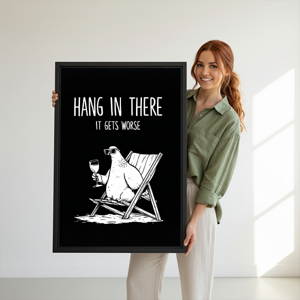 Unframed funny polar bear canvas wall art above small wooden tables, featuring white illustration on a black background.