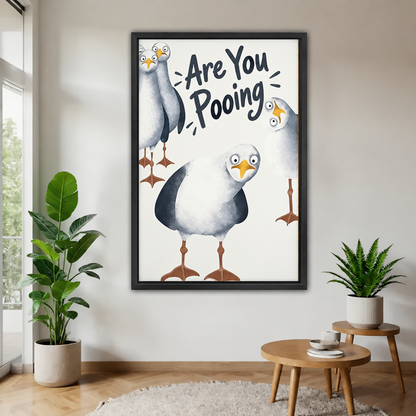 Funny seagull bathroom canvas wall art showing wide-eyed birds and playful lettering in a black frame.