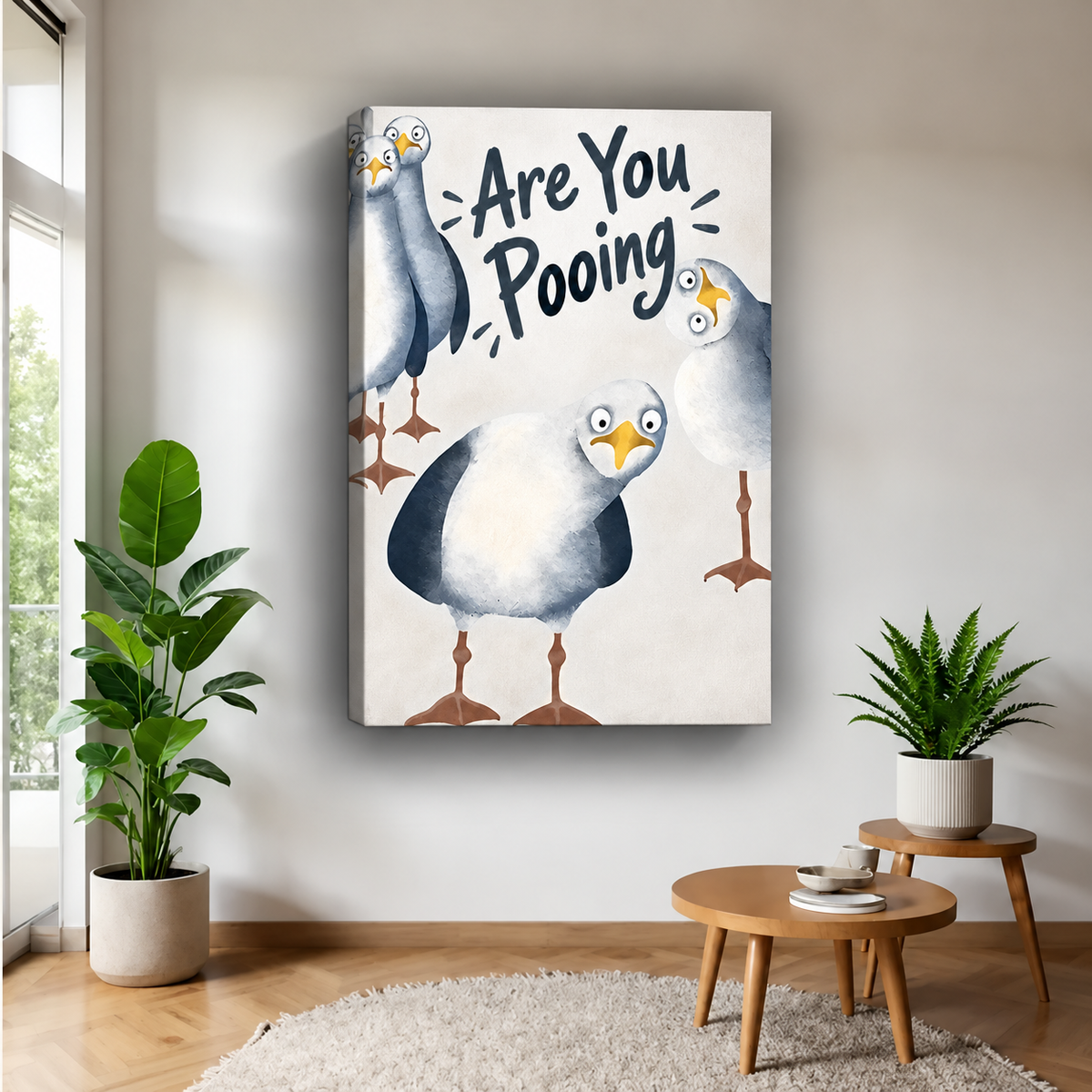 Funny seagull bathroom canvas wall art with “Are You Pooing?” lettering, displayed in a bright living room.