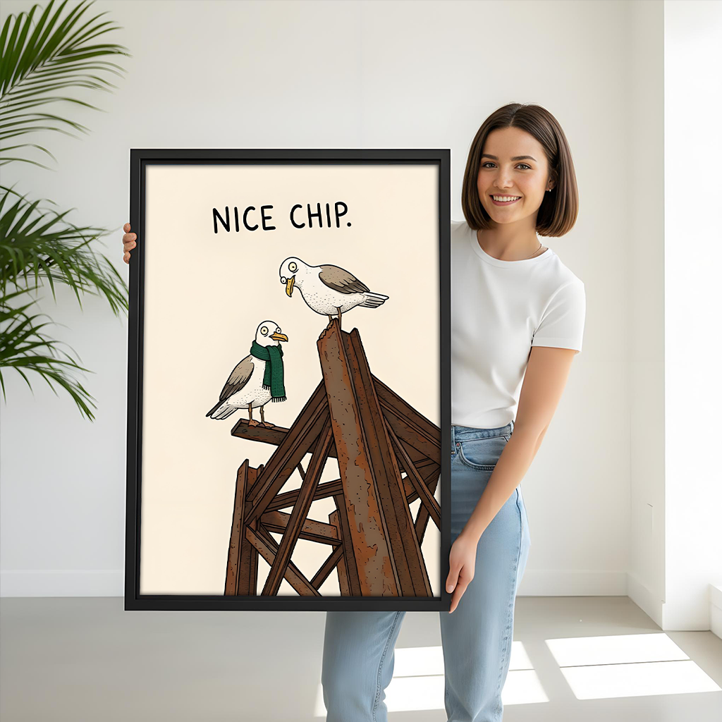 Woman holding large framed funny seagull Nice Chip humorous canvas wall art showing size scale in bright studio