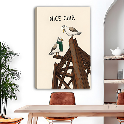 Unframed gallery-wrap funny seagull Nice Chip canvas displayed above wooden dining table in bright neutral dining room