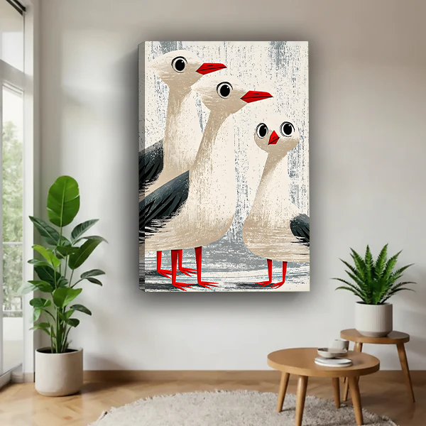 Funny seagull trio coastal canvas print without frame floating on white wall in modern living room with greenery