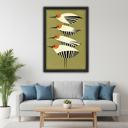 mid-century modern geometric bird canvas wall art in black float frame above gray sofa