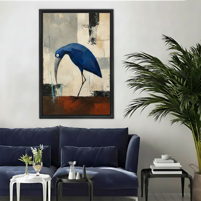 Geometric blue heron abstract framed canvas wall art in black frame above cream armchair in modern living room