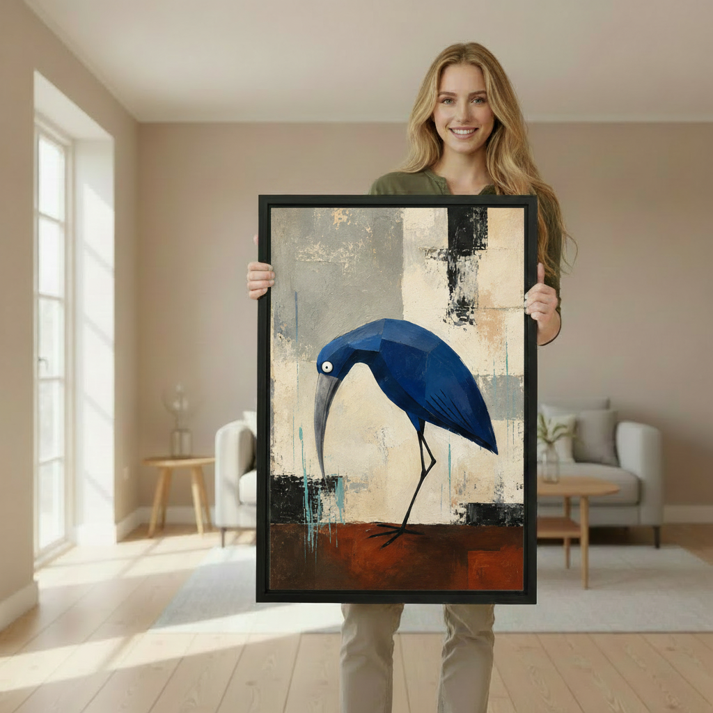 Woman holding large geometric blue heron abstract framed canvas wall art print in bright airy living room