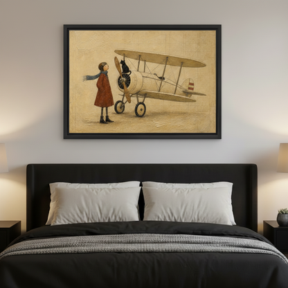 Black framed vintage storybook canvas of a girl in a red coat and aviator goggles standing beside a cream biplane with a black cat on the propeller, hung above a dark upholstered bed with white pillows and warm amber bedside lamps in a moody modern bedroom