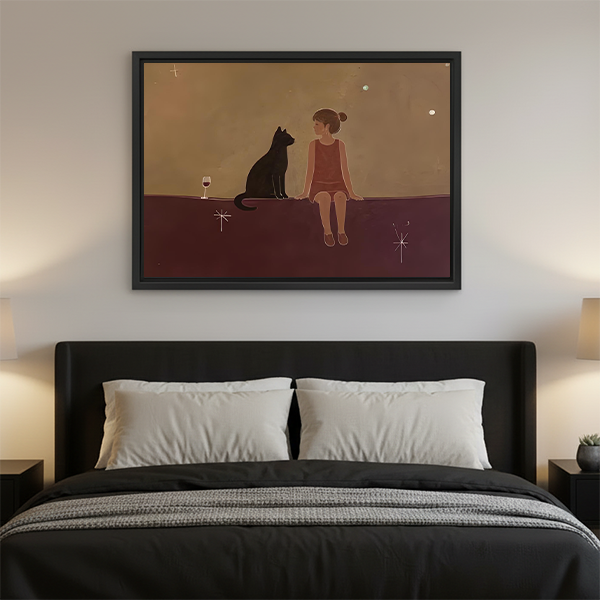Framed minimalist girl and black cat canvas wall art above a dark bed with white pillows at night