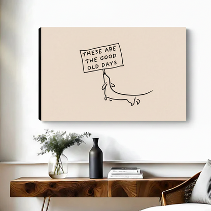 Frameless gallery wrap canvas of good old days dachshund line art above wood console with vase in bright minimalist living room
