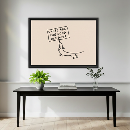 Good old days dachshund minimalist line art framed canvas above black console table with plants in modern entryway
