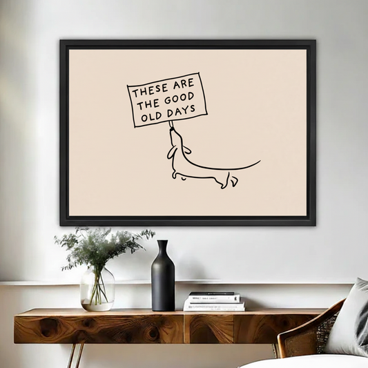 Good old days dachshund minimalist line art framed canvas above rustic wood console with vase in warm living room