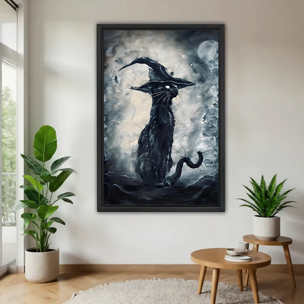 Gothic black witch cat canvas wall art displayed without an outer frame beside houseplants and wooden tables.
