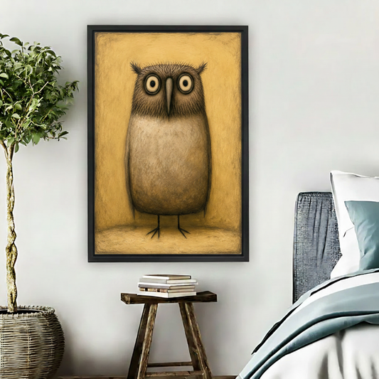 Gothic folk art owl canvas wall art in black frame above wooden stool in cozy white bedroom
