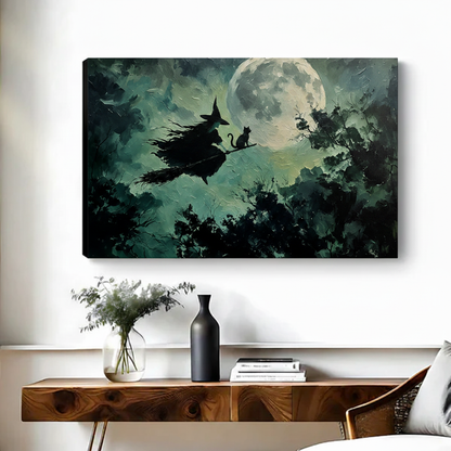 Frameless gallery wrap canvas of gothic witch riding broomstick with black cat under full moon above wooden console