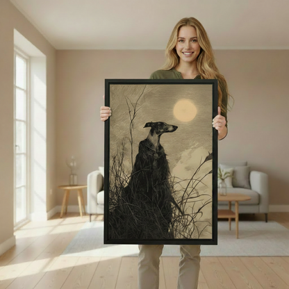 Woman holding a large black framed canvas of a dark greyhound under a full moon in vintage etching style, showing print size in a bright Scandinavian living room