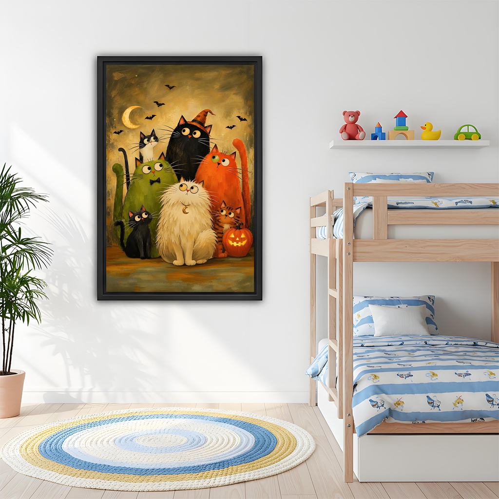 Whimsical Halloween cats canvas wall art in a black frame beside wooden bunk beds in a children’s bedroom.