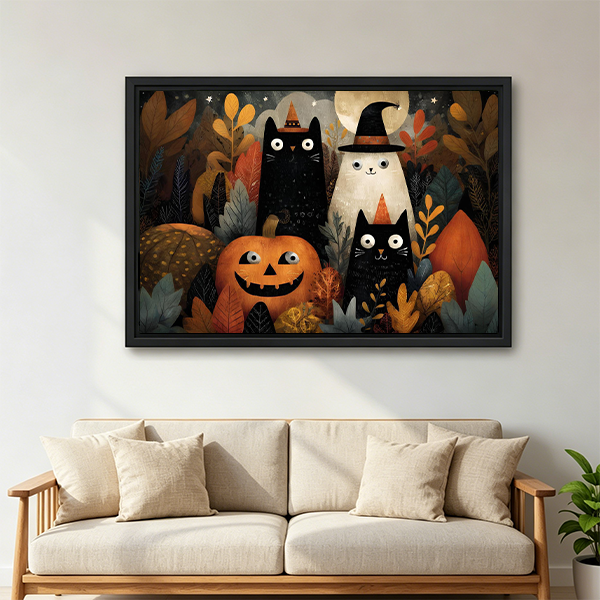 Halloween cats and ghost framed canvas wall art hangs above a white bed in a simple bedroom.