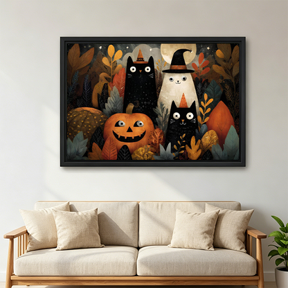 Halloween cats and ghost framed canvas wall art hangs above a white bed in a simple bedroom.