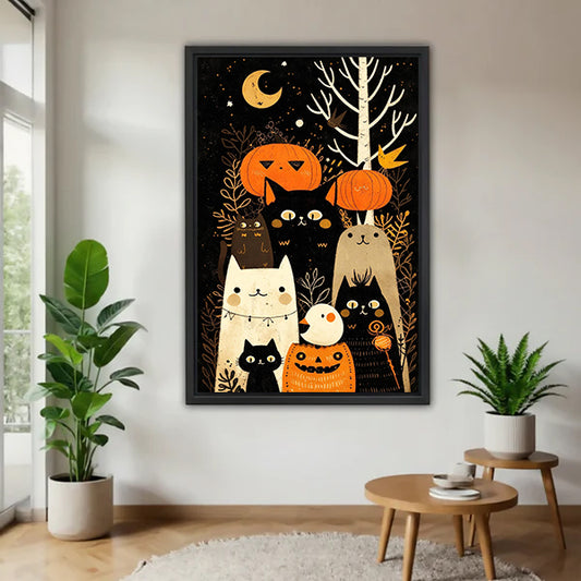 Black-framed Halloween cats and pumpkins canvas wall art displayed between potted plants
