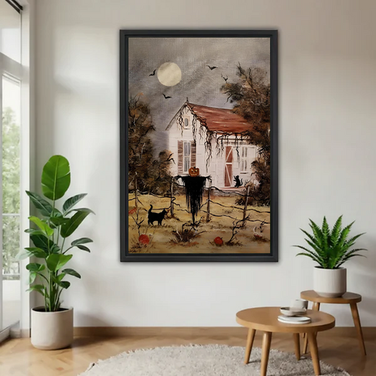 Framed rustic Halloween cottage canvas wall art with a full moon and black cats hanging above a cream sofa.