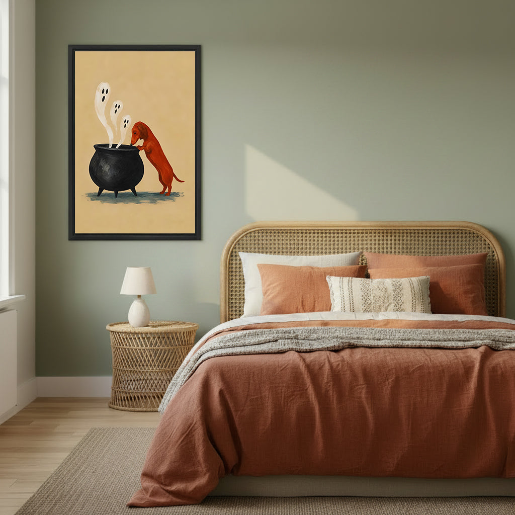 Halloween dachshund cauldron ghost cartoon rust red dachshund three white ghosts black cauldron warm sandy background black framed canvas wall art on sage green wall beside wide rattan arched headboard bed with terracotta linen and wicker round nightstand