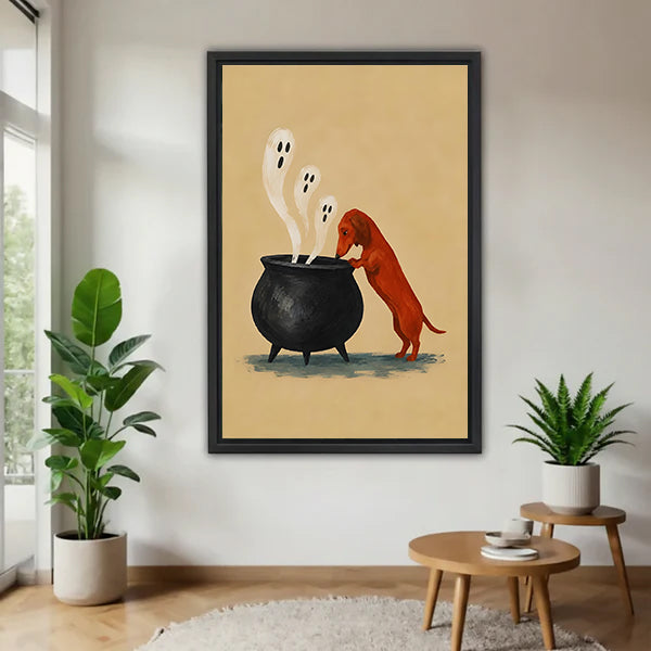 Halloween dachshund cauldron ghost cartoon rust red dachshund peeking into black iron cauldron three white ghosts sandy background black framed canvas wall art on white wall beside monstera and aloe plant with tiered round wood side table
