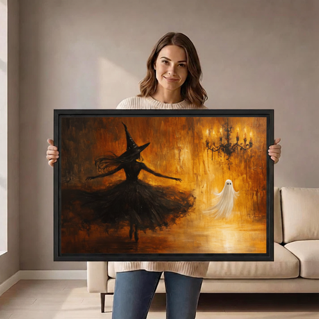 Woman holding horizontal framed canvas of witch in black hat dancing with glowing white ghost in amber candlelit ballroom⠋