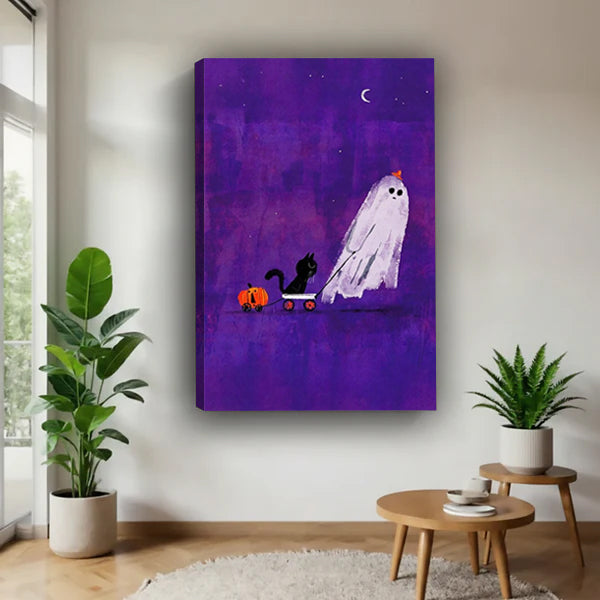 Halloween ghost pumpkin hat black cat pumpkin cart purple star night sky gallery wrap canvas wall art on white wall beside wood round side table and two green tropical potted plants