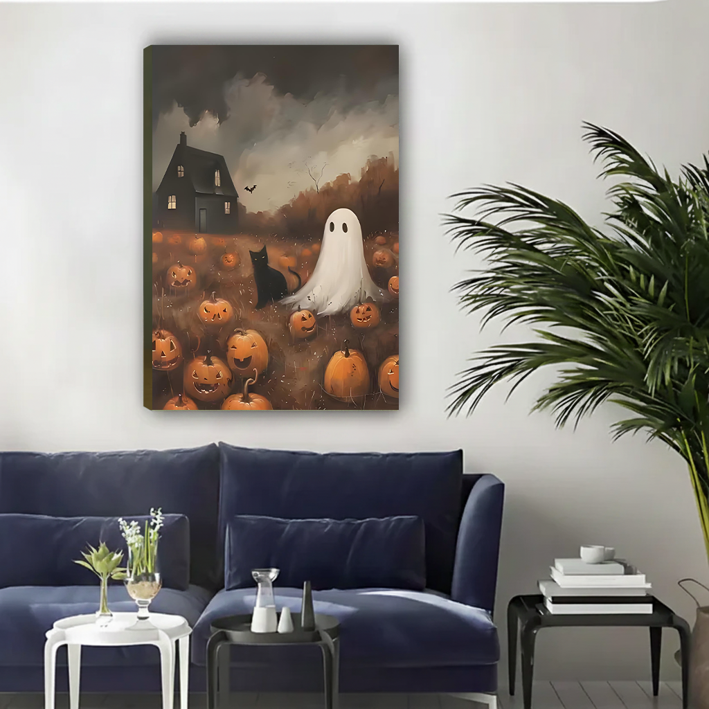 Halloween ghost and black cat canvas wall art surrounded by pumpkins above a cream armchair