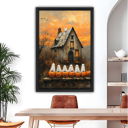 Framed Halloween ghost cottage canvas wall art with pumpkins and an orange sky beside wooden bunk beds.