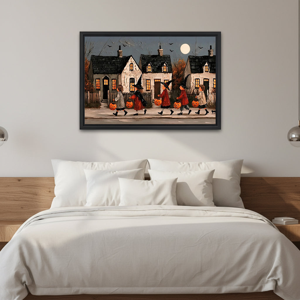 Framed vintage Halloween parade canvas wall art above a white bed with a wooden headboard