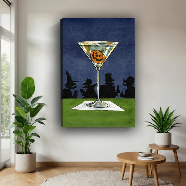Halloween pumpkin jack-o-lantern martini cocktail retro art witch silhouette star night sky gallery wrap canvas wall art on white wall beside round wood side table with monstera and aloe plants