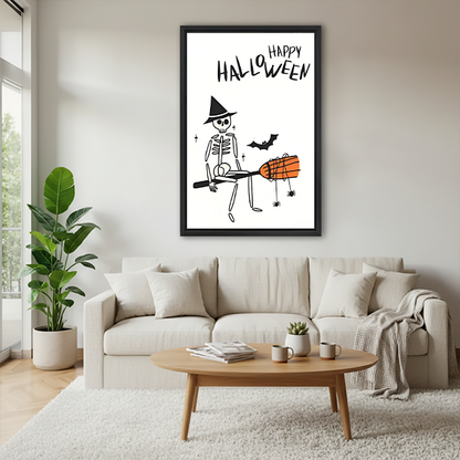 Framed Halloween skeleton canvas wall art with black linework and an orange broom hanging above a cream sofa.