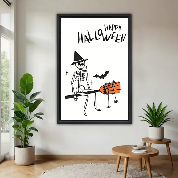 Gallery-wrap Halloween skeleton canvas wall art with a witch hat, bat, and orange broom displayed between houseplants.