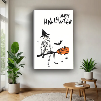 Black-framed Halloween skeleton canvas wall art with Happy Halloween lettering and an orange broom above wooden tables.