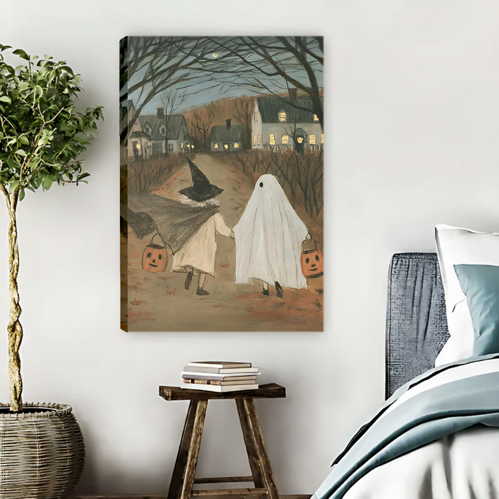 Framed Halloween trick-or-treat canvas wall art displayed above a bedside table in a cozy bedroom
