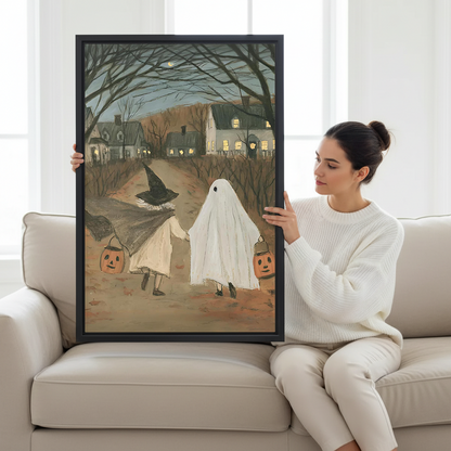 Gallery-wrap Halloween trick-or-treat canvas wall art displayed beside a bed in a softly lit bedroom