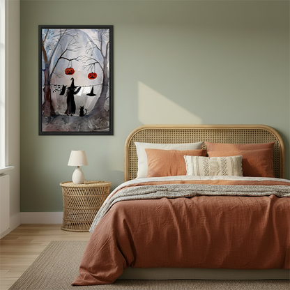 Framed Halloween witch and cat canvas wall art hanging above a bedside table in a cozy bedroom.