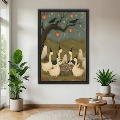 Halloween witch geese party folk art six white geese black witch hats two crows pumpkin lantern crescent moon black framed canvas wall art on white wall beside wood round table with two tropical green plants
