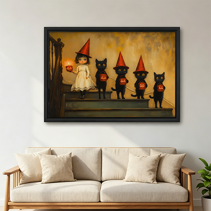 Smiling woman holding large black framed Halloween witch girl and black cats canvas print showing art size reference