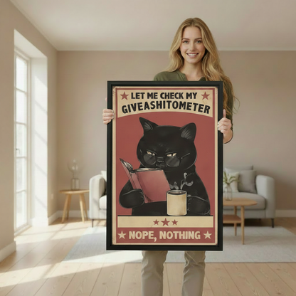Woman holding large framed funny black cat giveashitometer vintage poster art print showing actual print size in bright beige living room