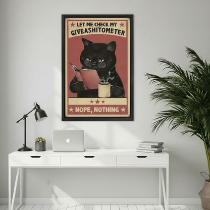 Humorous black cat giveashitometer nope nothing retro wall art print in black frame above white desk with laptop and succulent in minimalist home office