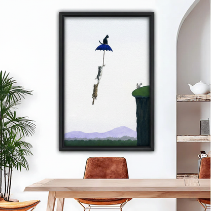 Surreal framed canvas print of three cats flying with a blue umbrella over mountain cliffs – whimsical cat wall art