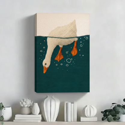White goose diving into teal water float frame canvas wall art displayed on white shelf with sculptural ceramic decor