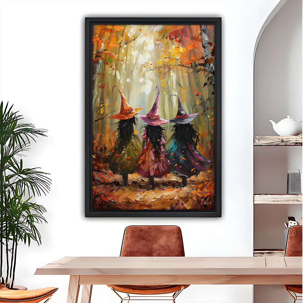 Impressionist autumn witches forest framed canvas wall art in black frame above light wood dining table with leather chairs and arched mirror