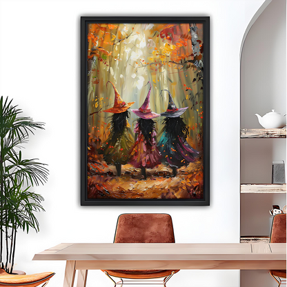 Impressionist autumn witches forest framed canvas wall art in black frame above light wood dining table with leather chairs and arched mirror