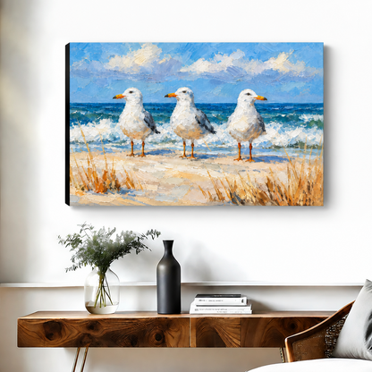 Gallery-wrap impressionist seagull beach canvas wall art shows three birds beside blue waves and sandy grasses.