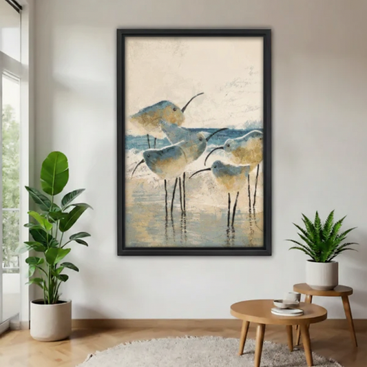 Impressionist coastal shorebirds canvas wall art in black frame, minimalist white wall room with plants