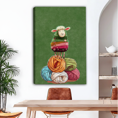 Gallery-wrap knitting sheep canvas art featuring a striped sheep balanced above five colorful yarn balls.
