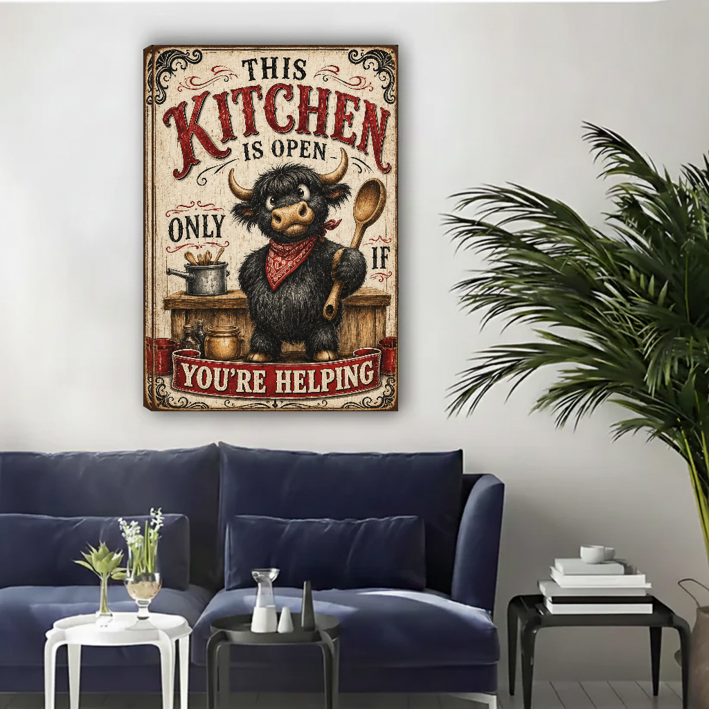 Unframed rustic highland cow kitchen canvas wall art above a navy sofa in a bright living room.